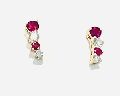 photo number one of 14 karat yellow gold ruby and diamond stud earrings item 001-215-01020