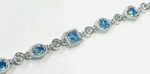 photo of Sterling silver 7'' 7.51 carat blue topaz bracelet item 001-225-00133