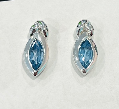 photo number one of Sterling silver blue topaz earrings item 001-215-01016