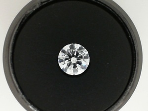 photo of Loose round 0.72 carat natural diamond with I1 clarity G/H color item 001-105-00405