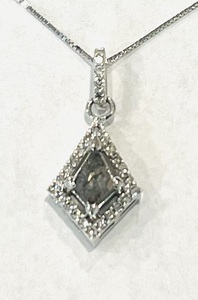 photo of 14 karat white gold .65 carat kite shaped salt and pepper diamond pendant with .21 carat of accents diamonds on a 20'' box chain item 001-130-00786