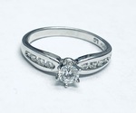 photo of 14 karat white gold engagement ring with one .24 carat center diamond and .18 diamond accents item 001-423-00032